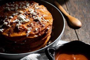 brown and white pastry on black pan